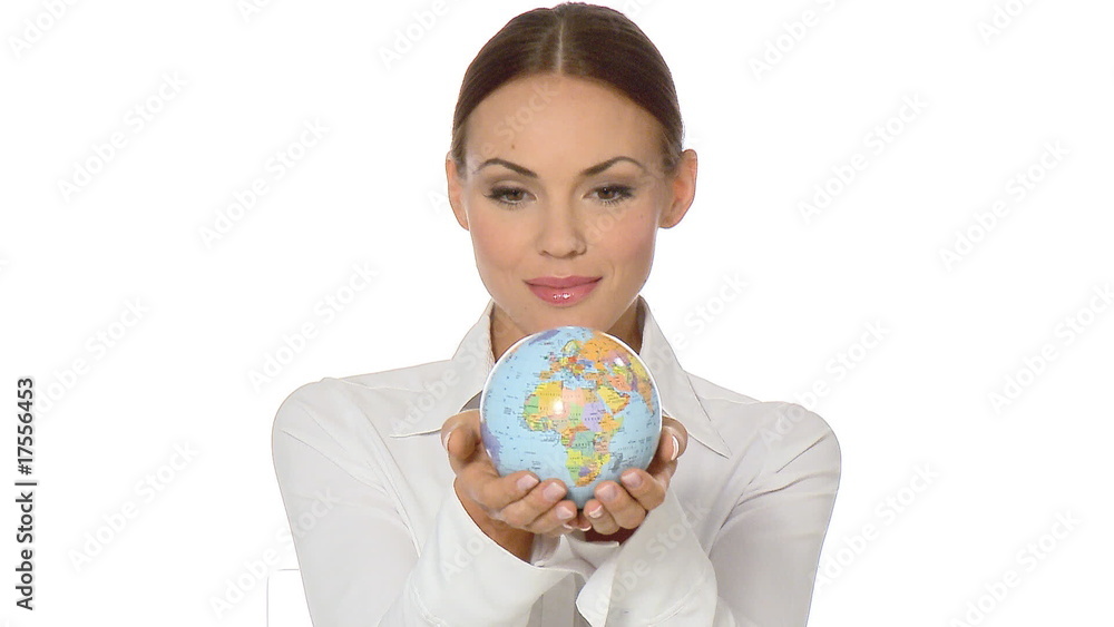 Beautiful young businesswoman is holding a globe Beautiful young businesswoman is holding a globe