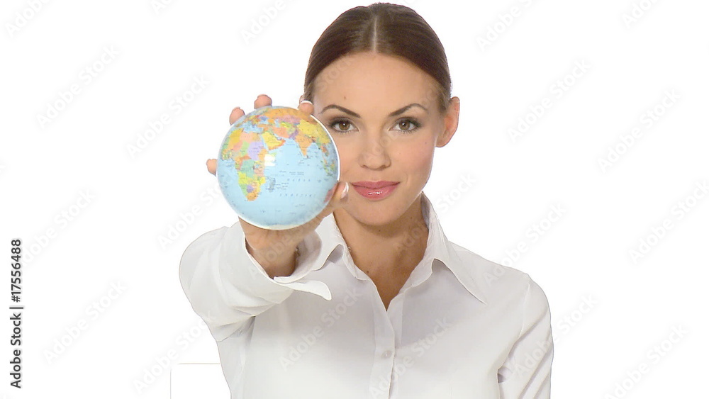 Beautiful young businesswoman is holding a globe Beautiful young businesswoman is holding a globe