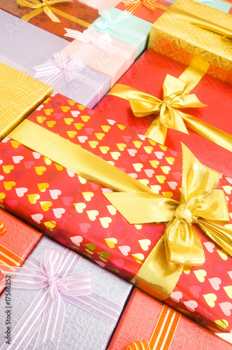 Close up of gift box with golden ribbon