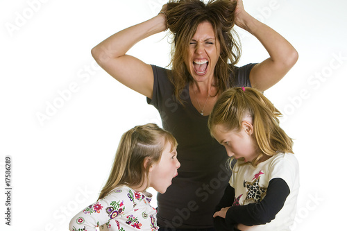 Stressed out Mom with fighting kids