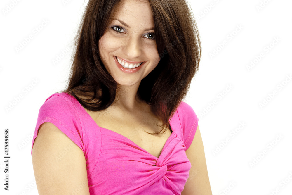 Beautiful young woman in pink dress smiling on white background Beautiful young woman in pink dress smiling on white background
