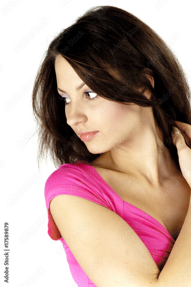 Beautiful young woman in pink dress smiling on white background Beautiful young woman in pink dress smiling on white background