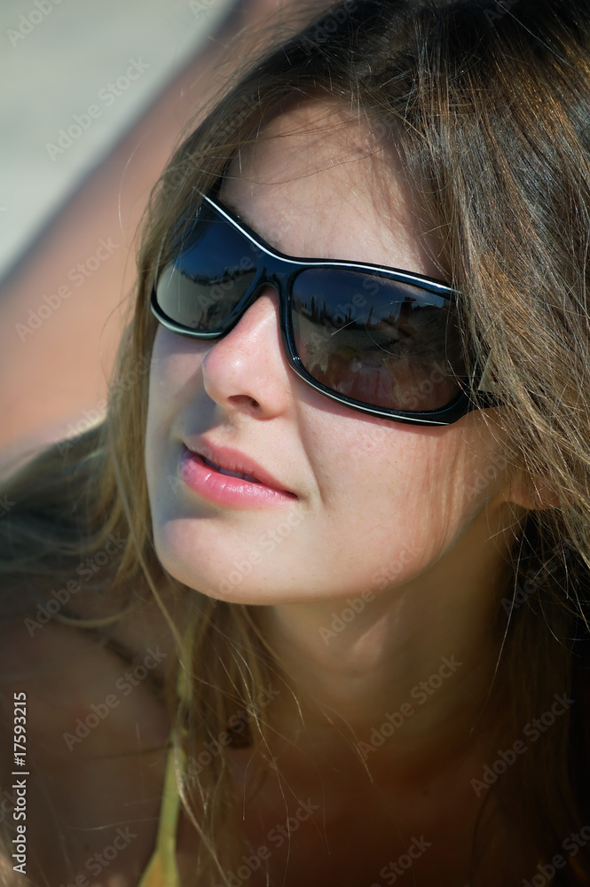 girl in a clear summer day on a marine beach girl in a clear summer day on a marine beach