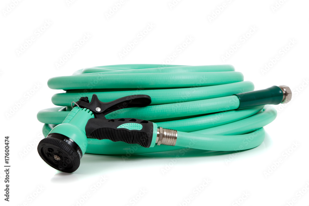 Green garden hose with spray nozzle Green garden hose with spray nozzle