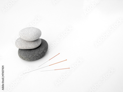 acupuncture needles concept of zen and earth photo