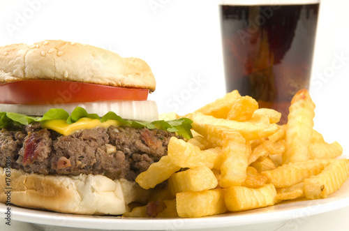 Cheeseburger with fries and soda pop