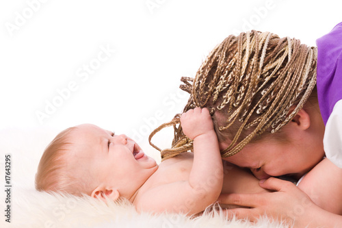 фотографія Mother playing with baby
