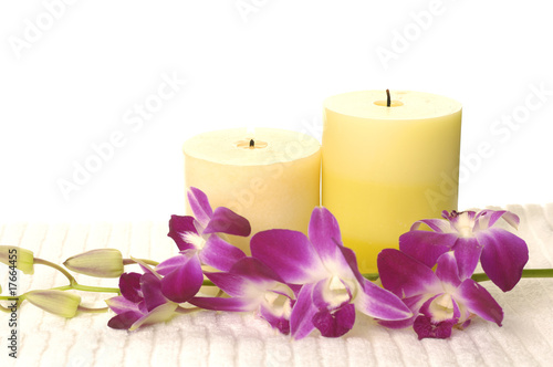 Candle and pink orchid