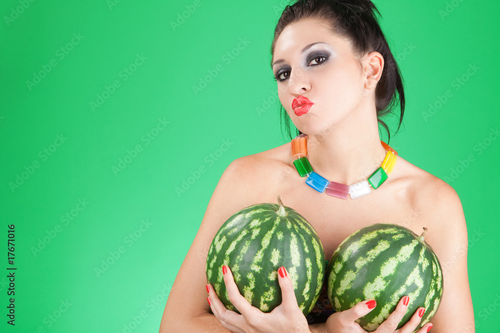 fun woman with watermelons on the green background fun woman with watermelons on the green background