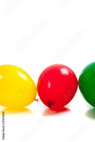 Multi-colored balloons on white