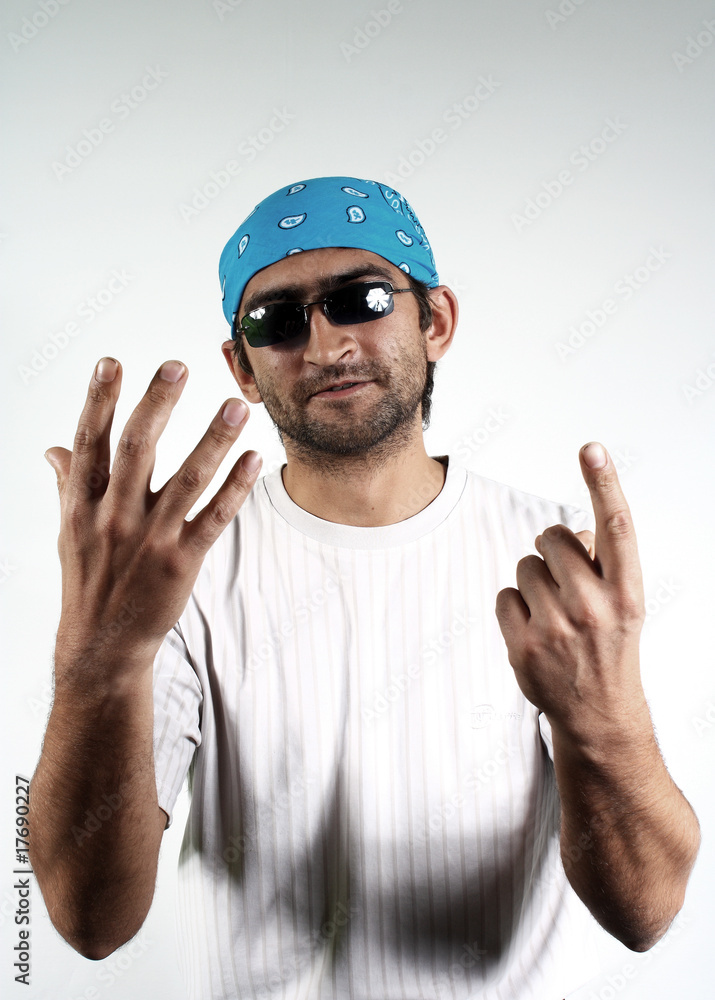 man in dark glasses and a bandana man in dark glasses and a bandana