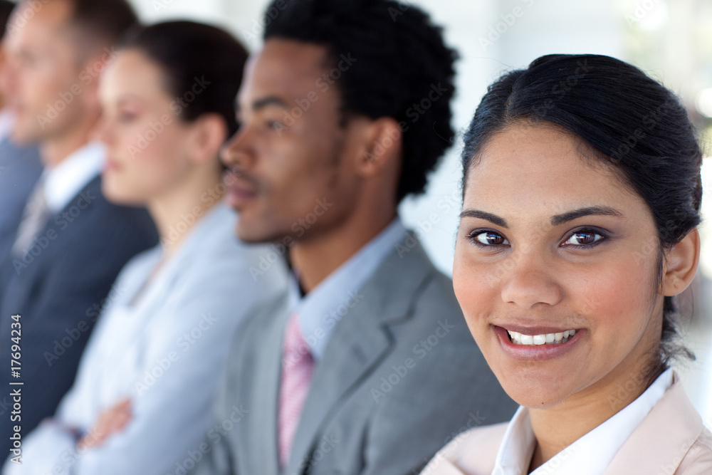 Beautiful businesswoman with her team in a line Beautiful businesswoman with her team in a line