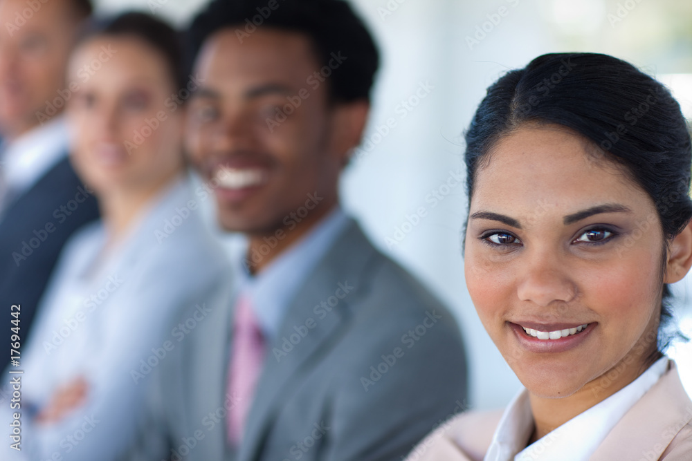 Beautiful businesswoman with her team in a line Beautiful businesswoman with her team in a line