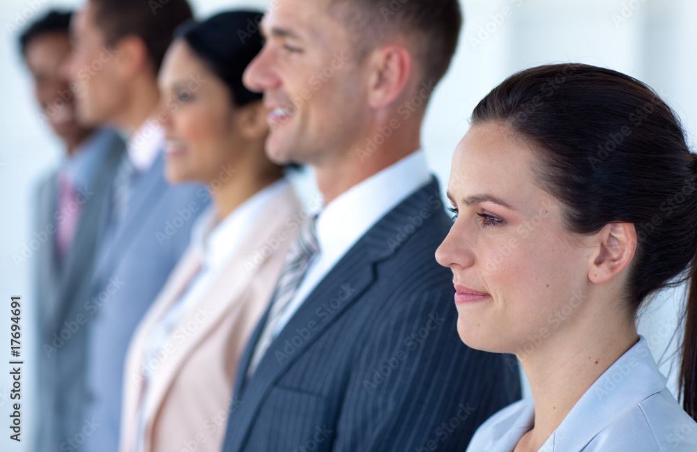 Beautiful businesswoman with her team in a line Beautiful businesswoman with her team in a line
