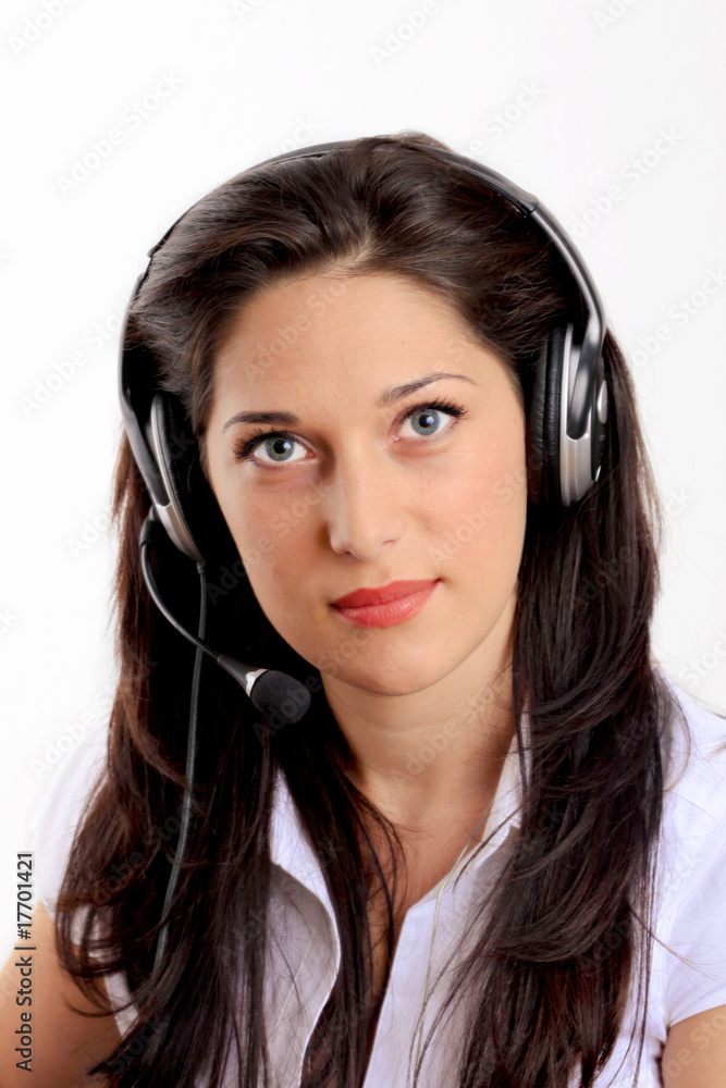 Smiling pretty business woman with headset. Smiling pretty business woman with headset.