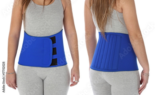 Patient wearing an orthopeadic girdle over white