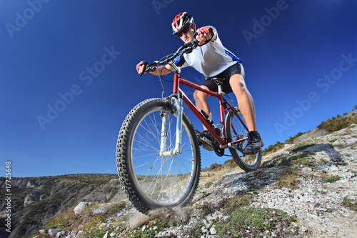 Person riding a bike downhill style © Ljupco Smokovski