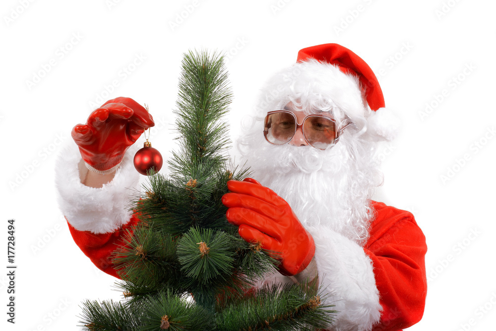 santa claus in shades decorating a christmas tree santa claus in shades decorating a christmas tree