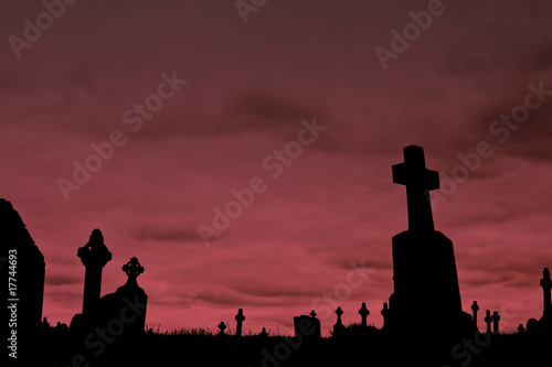 Crosses silhouettes against a cloudy sky