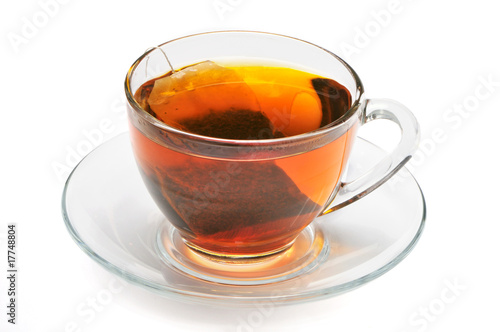 Cup of tea with tea bag on a white background
