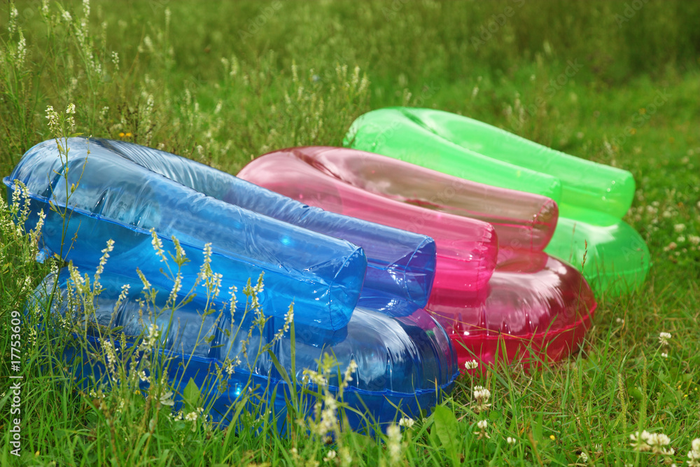 Fototapeta premium Inflatable armchairs on lawn