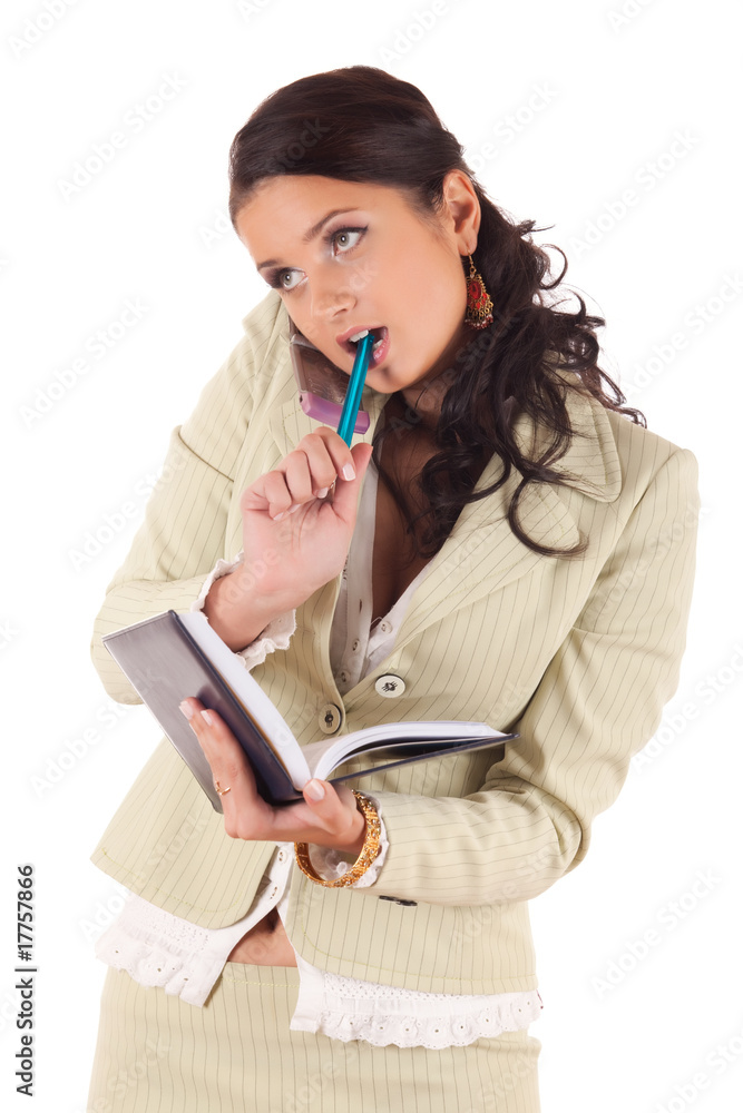 Businesswoman with cell phone and diary Businesswoman with cell phone and diary