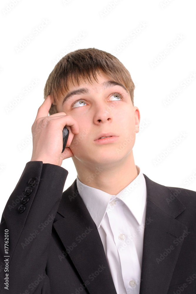 teenager is thinking and holding a mobile phone teenager is thinking and holding a mobile phone