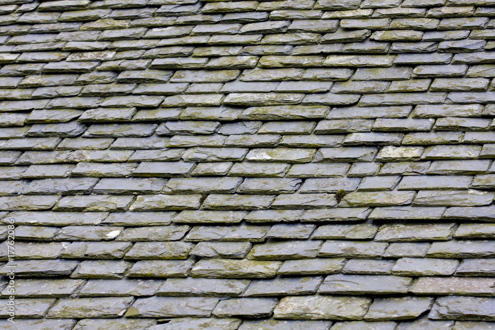 a roof in construction with slates