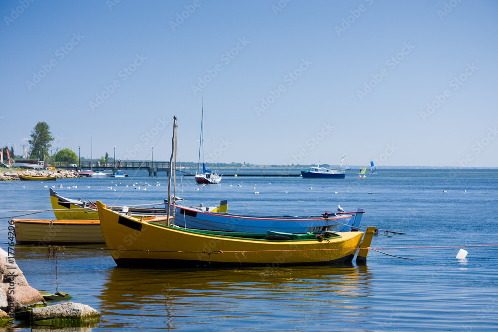 Fishing boats on a sea shore