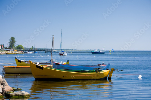 Fishing boats on a sea shore