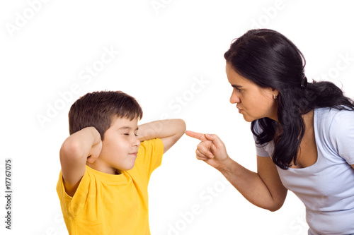 Mother scolding her son photo