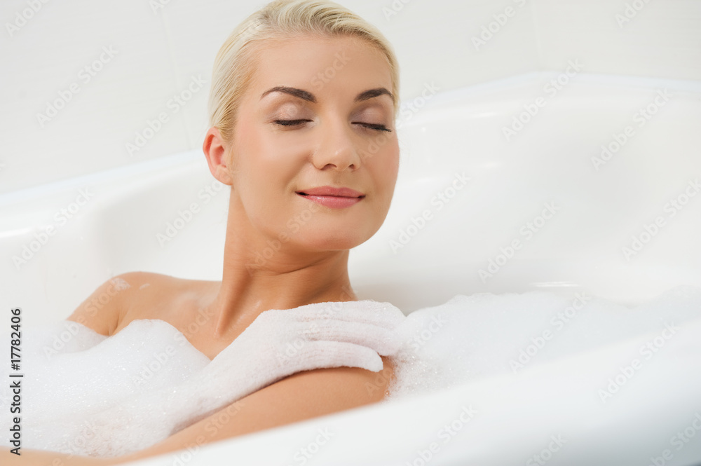 Young woman washing in bathroom .... Young woman washing in bathroom ....