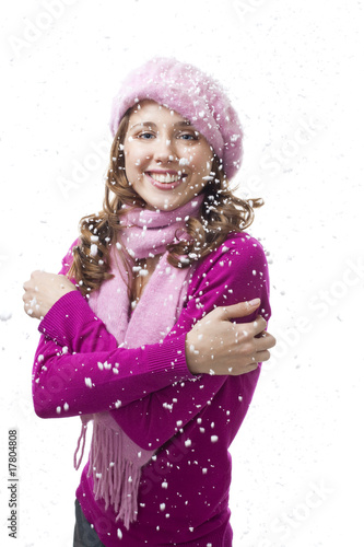 Woman smile while snowflakes fall