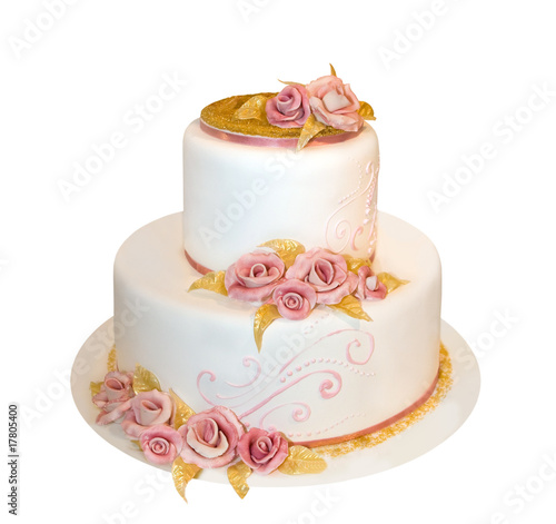 Wedding cake decorated with marzipan roses (isolated on white)