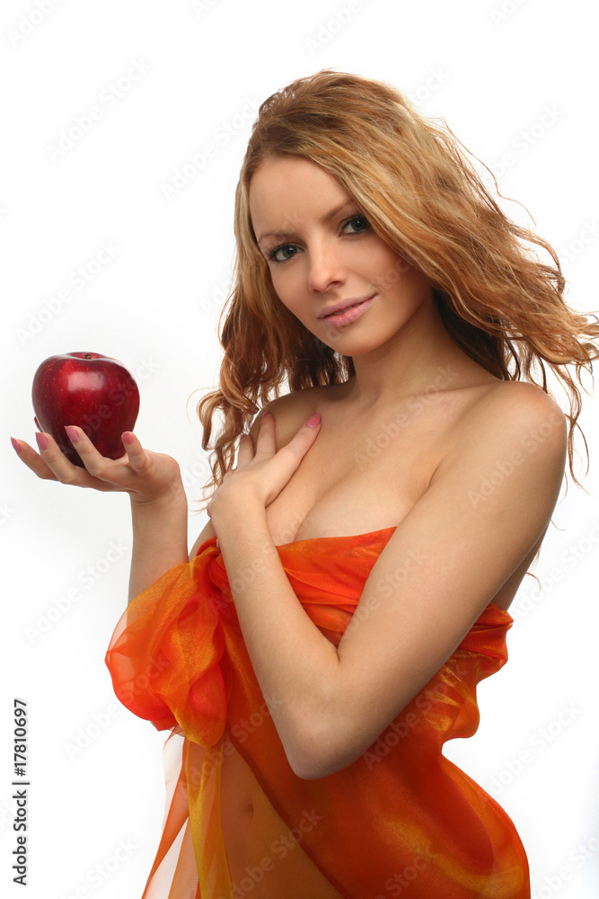 girl holding in her hand a red apple
