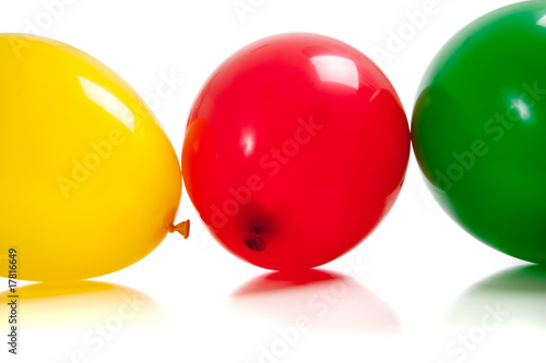 Multi-colored balloons on white