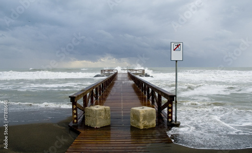 Stormy sea on a pier