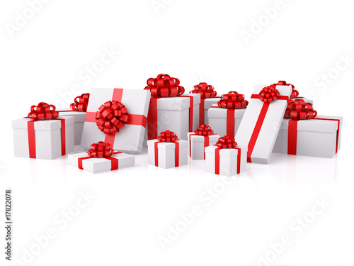 Group of white gift boxes with red festive bows