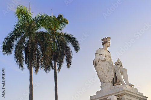 Havana statue and royal palms