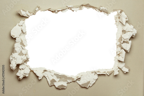 Hole in the grey plasterboard.