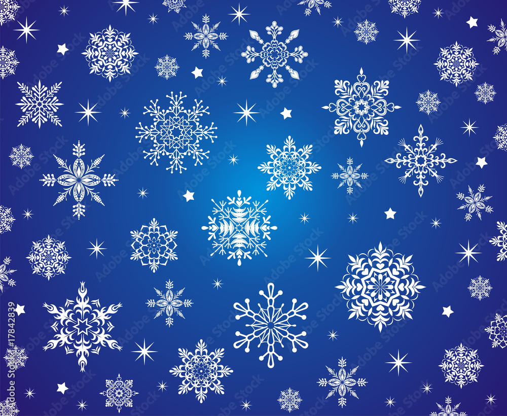 Snowflakes on the blue background. Snowflakes on the blue background.