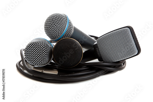Assorted Microphones on White with a cord