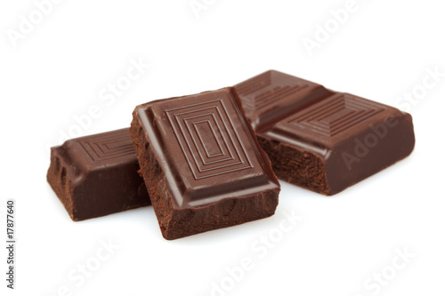 Pieces of dark chocolate isolated
