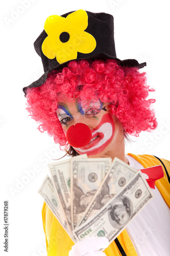 Fototapeta Naklejka Na Ścianę i Meble -  Funny clown holding money