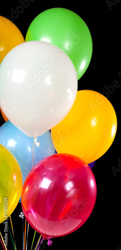 Assorted balloons on a black background
