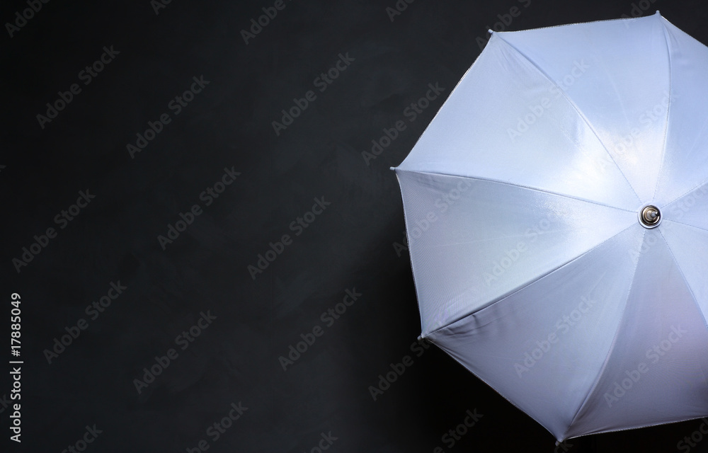 white umbrella on a gray background - obrazy, fototapety, plakaty 