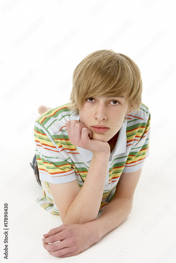 Studio Portrait Of Serious Teenage Boy Studio Portrait Of Serious Teenage Boy