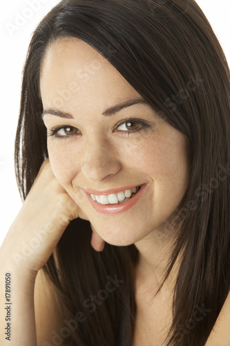 Studio Portrait Of Smiling Woman