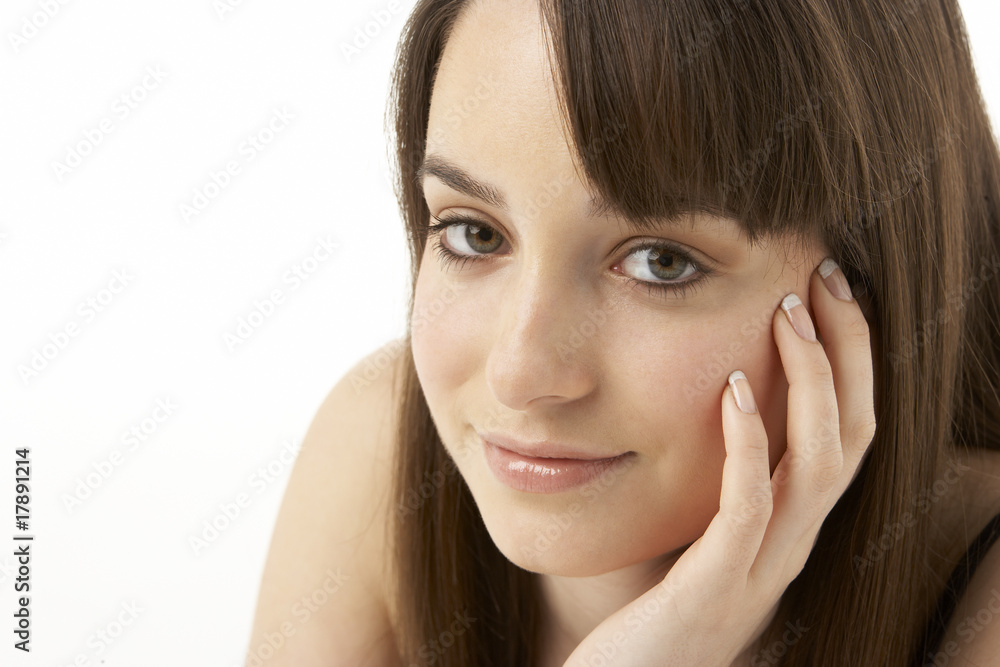 Studio Portrait Of Teenage Girl On White Background Studio Portrait Of Teenage Girl On White Background
