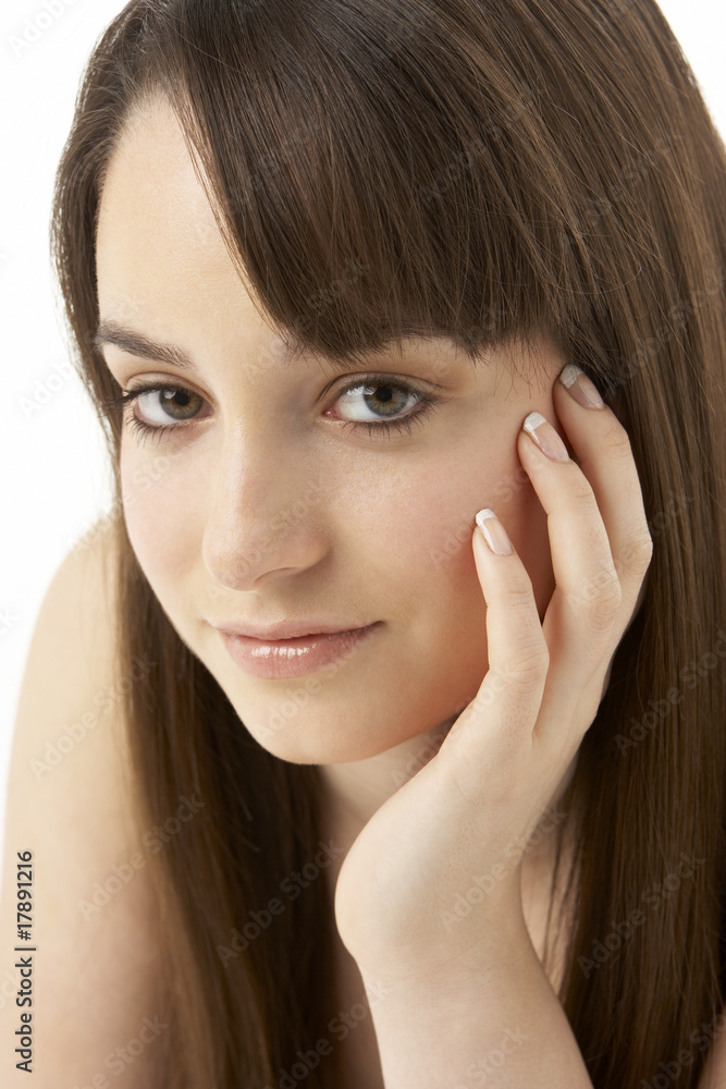 Studio Portrait Of Teenage Girl On White Background Studio Portrait Of Teenage Girl On White Background